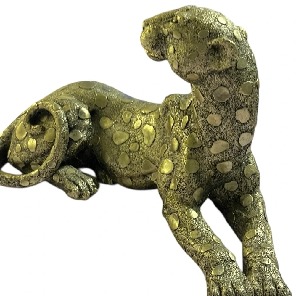 Leopard seated figurine